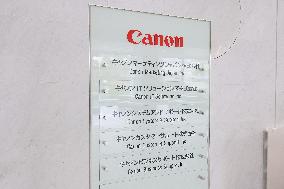 Canon Marketing Japan signboard and logo